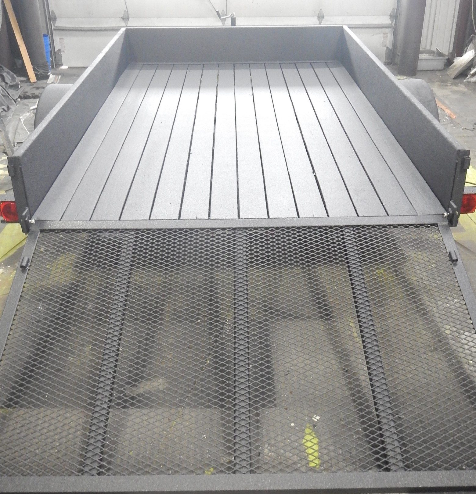Camper, RV, trailer and mobile home inventory treated on a dealer lot before winter storage